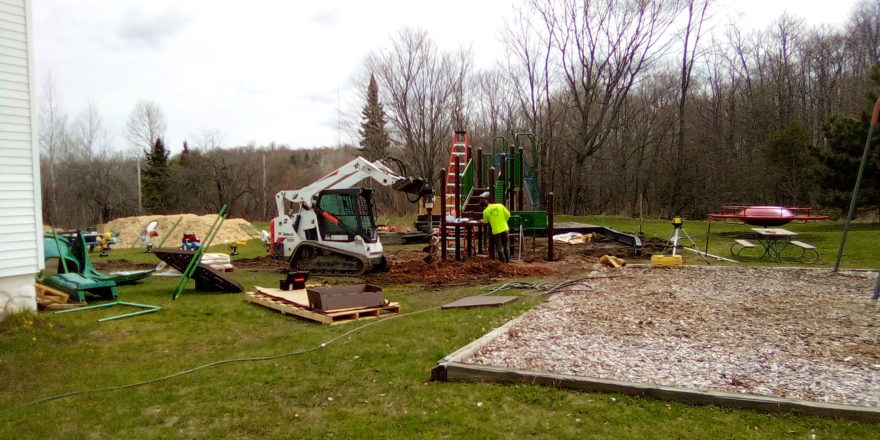 Playground Installation 0f spring 2020. Bobcat work and structure placement of posts and platforms.