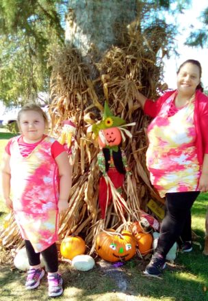 Olivia and Ms. Christine at the Hulkkonen pumpkin farm.