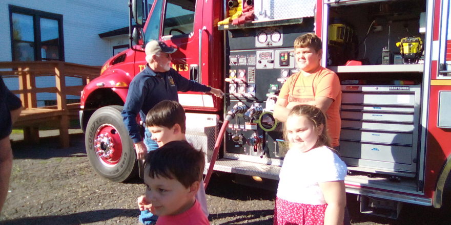 Lots of gadgets on the big red fire truck.