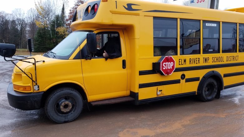 school bus driver in headless halloween costume.