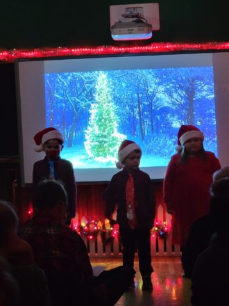 Justin, Oliver, and Olivia singing Little Snowflake.