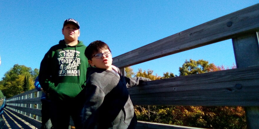 Reggie and Justin on trestle bridge.