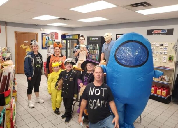 Ms. J. Ms. Christine, Oliver in yellow costume, Justin in ship captain costume, Olivia as a witch, Mr. Greg as not scary, and Avery in his blue blow up costume.