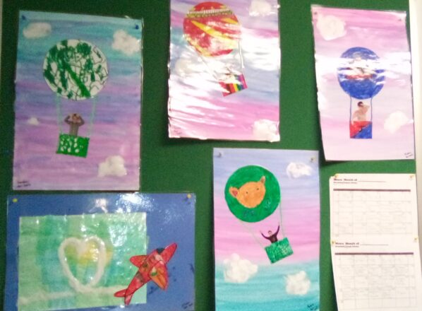 kids made art projects for themselves in hot air balloon ride, and also an airplane they colored for their water color back ground and made a smoke trail with cotton in a heart shaped loop.