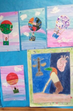 Art projects that kids made with coloring a circle and and a basket. Made a background with water colors for the sky and then glued on picture of themselves with balloon on top and basket under them, to make hot air balloon ride. Yarn was used to make the strings from basket to balloon.