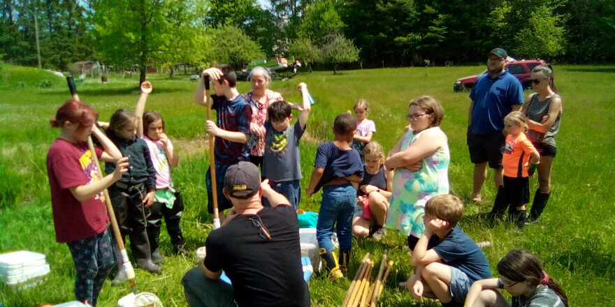 Elm River school kids visit Arvon school kids of a field trip to a pond.