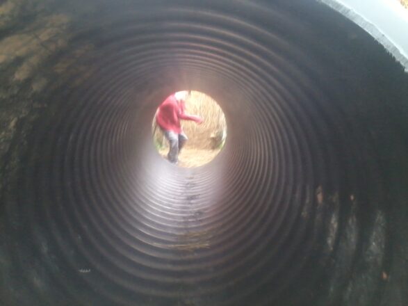 Looking through the culvert tunnel hay bale area.