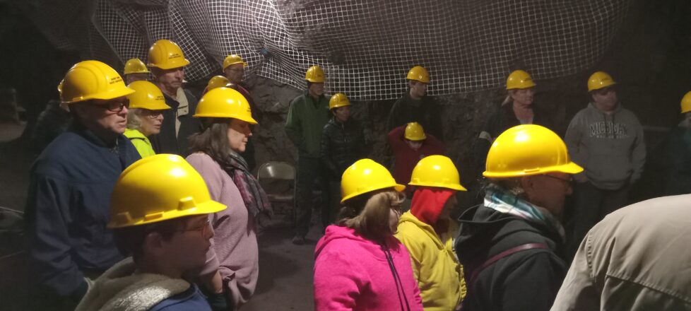 All of the students down in the mine getting a lecture of knowledge about how things were done.