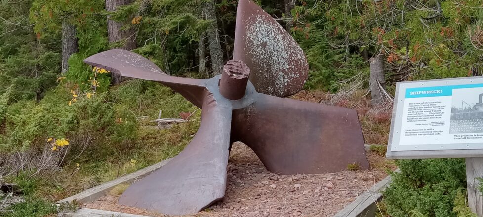 On display at the Copper Harbor Light House walking trail exhibit is one of the boat propellers.